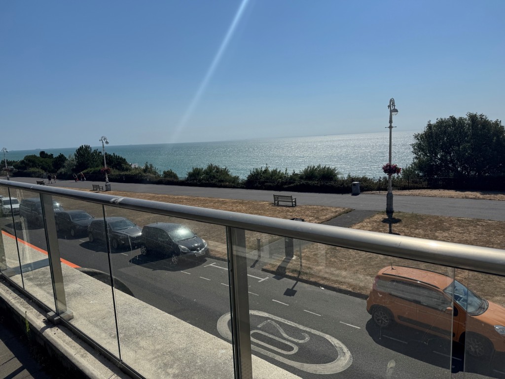 Lot: 207 - TWO-BEDROOM FIRST FLOOR APARTMENT WITH SEA VIEWS - View from balcony view 2